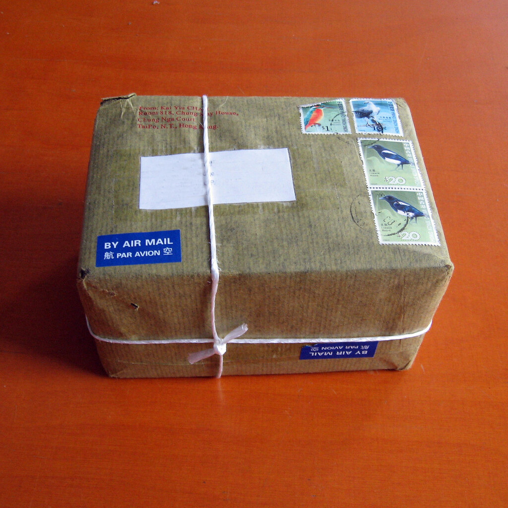 Photo of a parcel wrapped in brown paper
