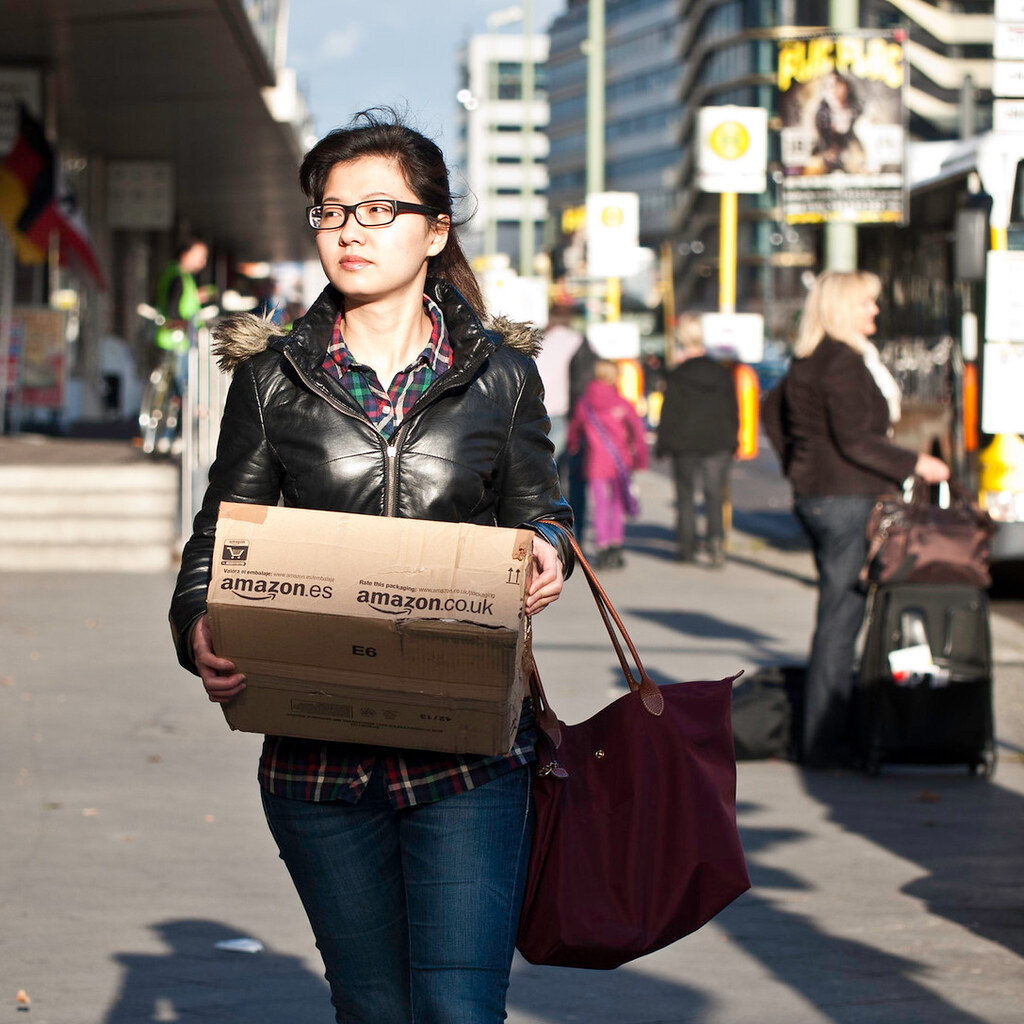 Photo of a woman holding a parcel