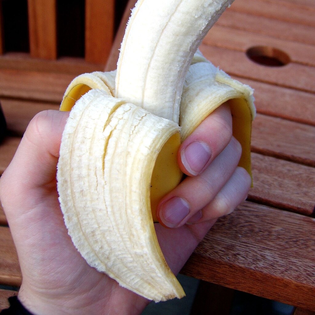 Photo of a peeled banana.
