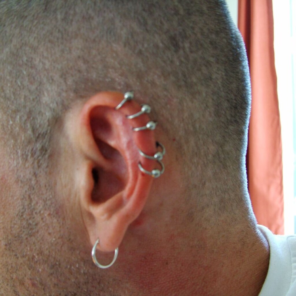 Photo of a man with pierced ears