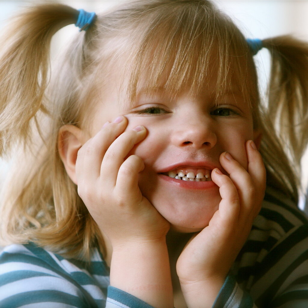 Photo of a little girl with pigtails