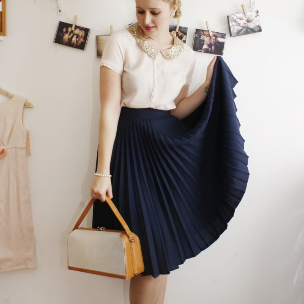 Photo of a girl wearing a pleated skirt