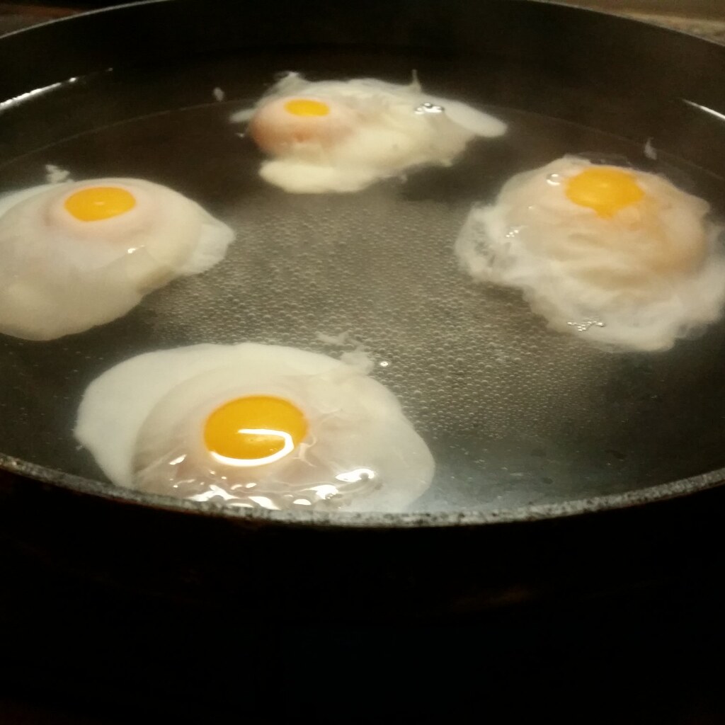 Photo of eggs being poached