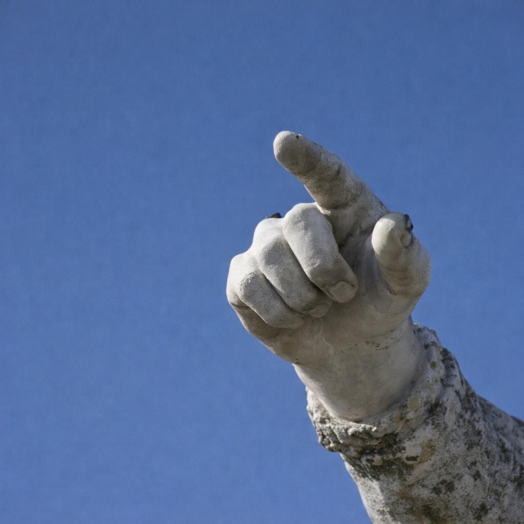 A statue pointing.
