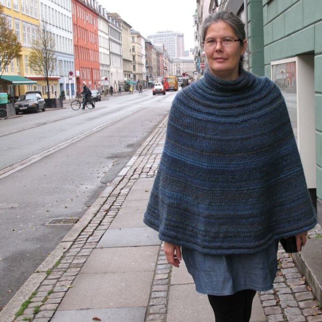 Photo of a woman wearing a poncho