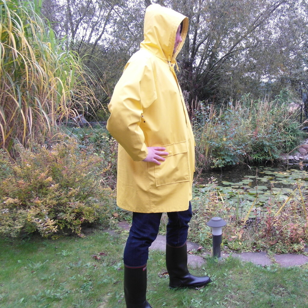 Photo of a man wearing a raincoat