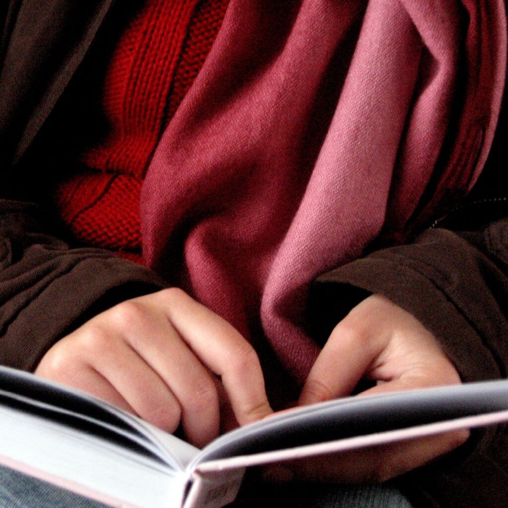 Photo of someone reading a book