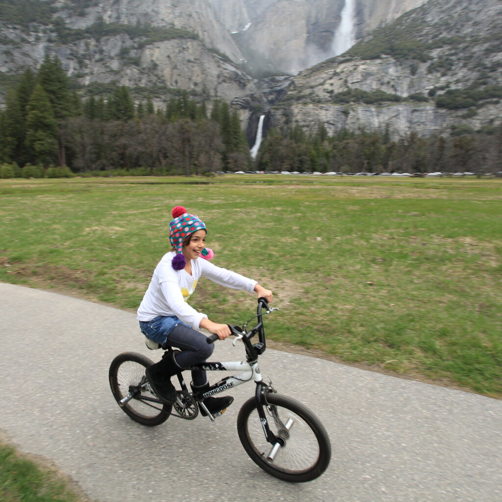 Photo of a girl riding a bike