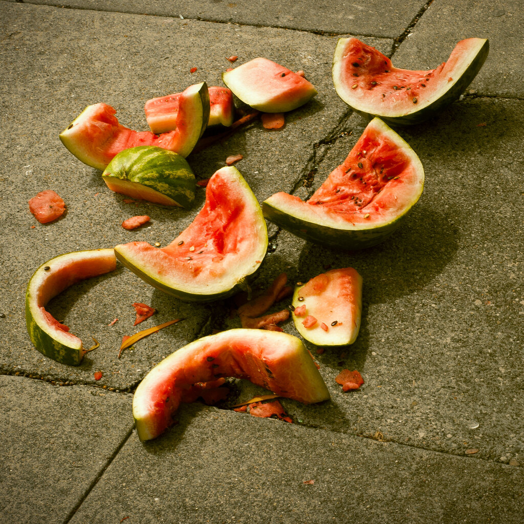 Photo of someone eating watermelon