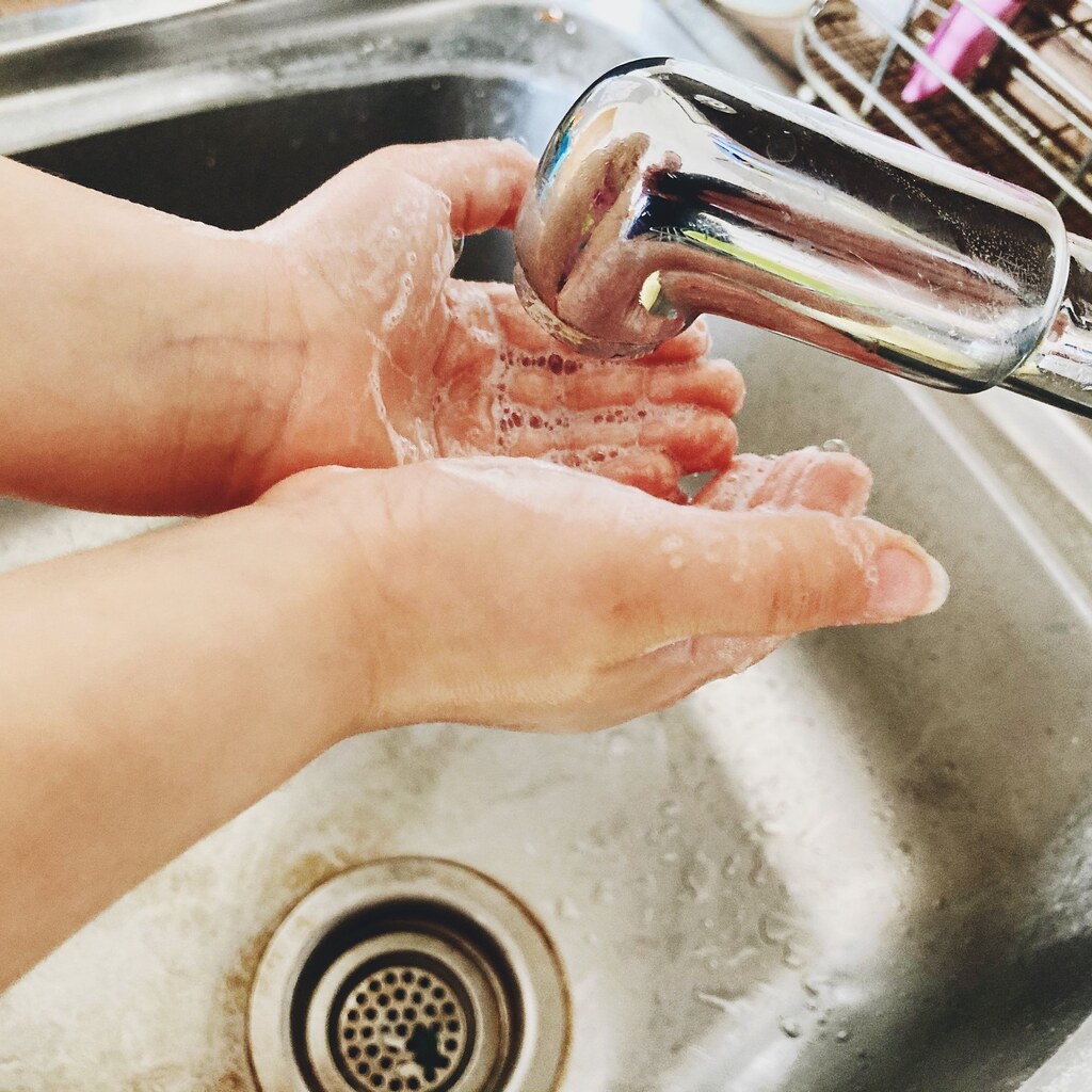 Photo of someone rinsing their hands