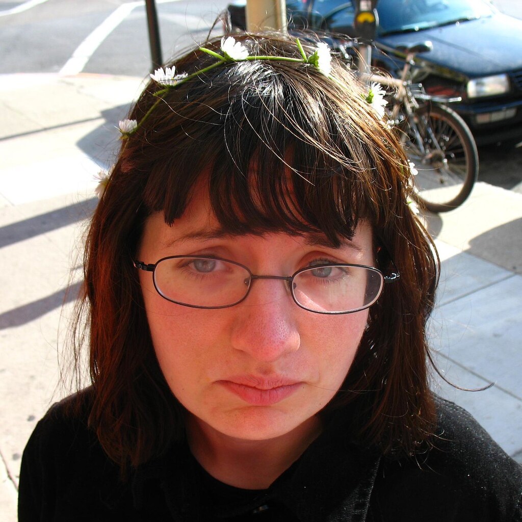 Photo of a sad looking lady.