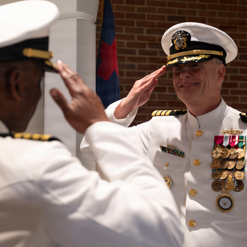 Photo of officers saluting