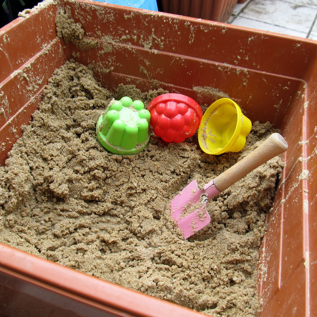 A small balcony sandpit