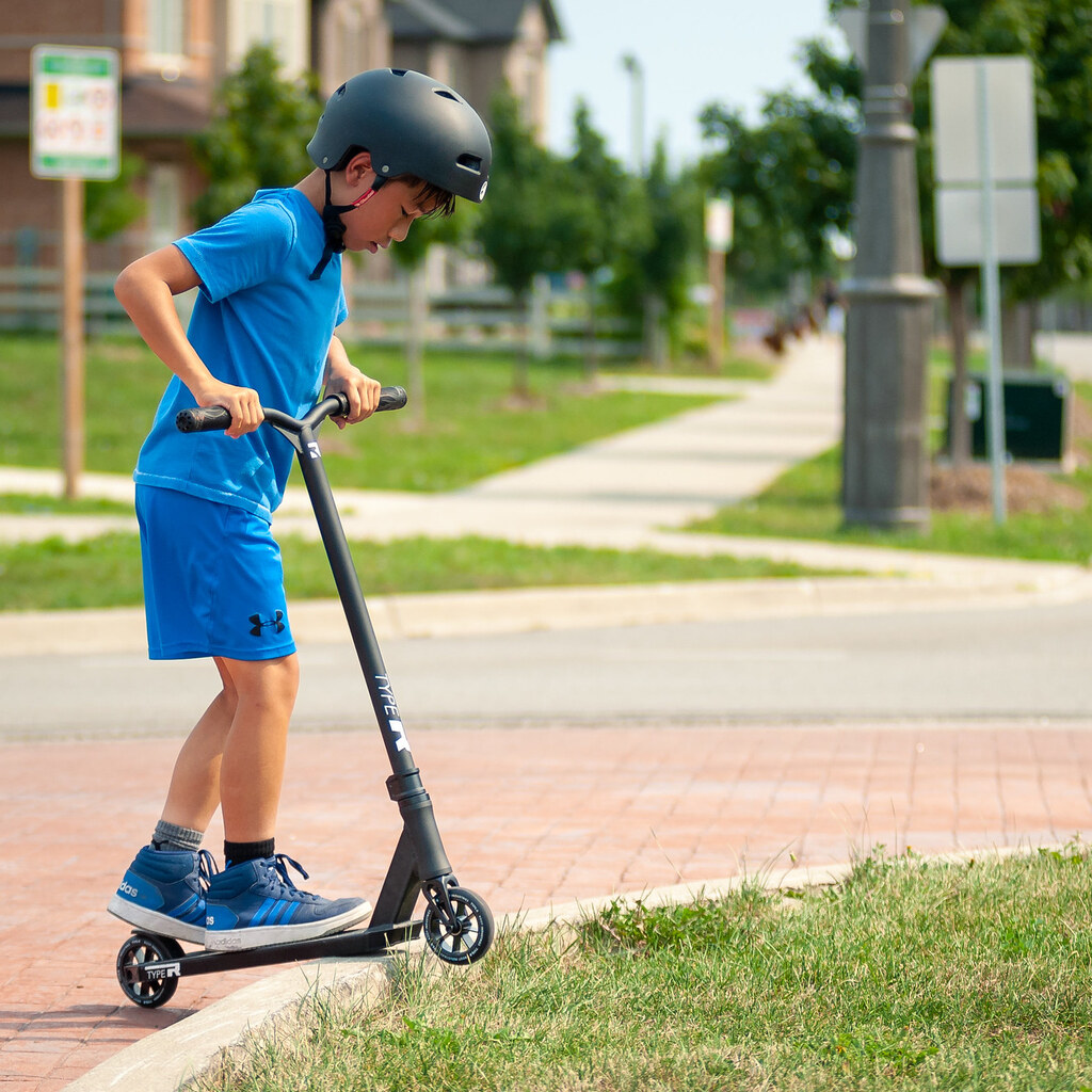 Photo of a boy on a scooter
