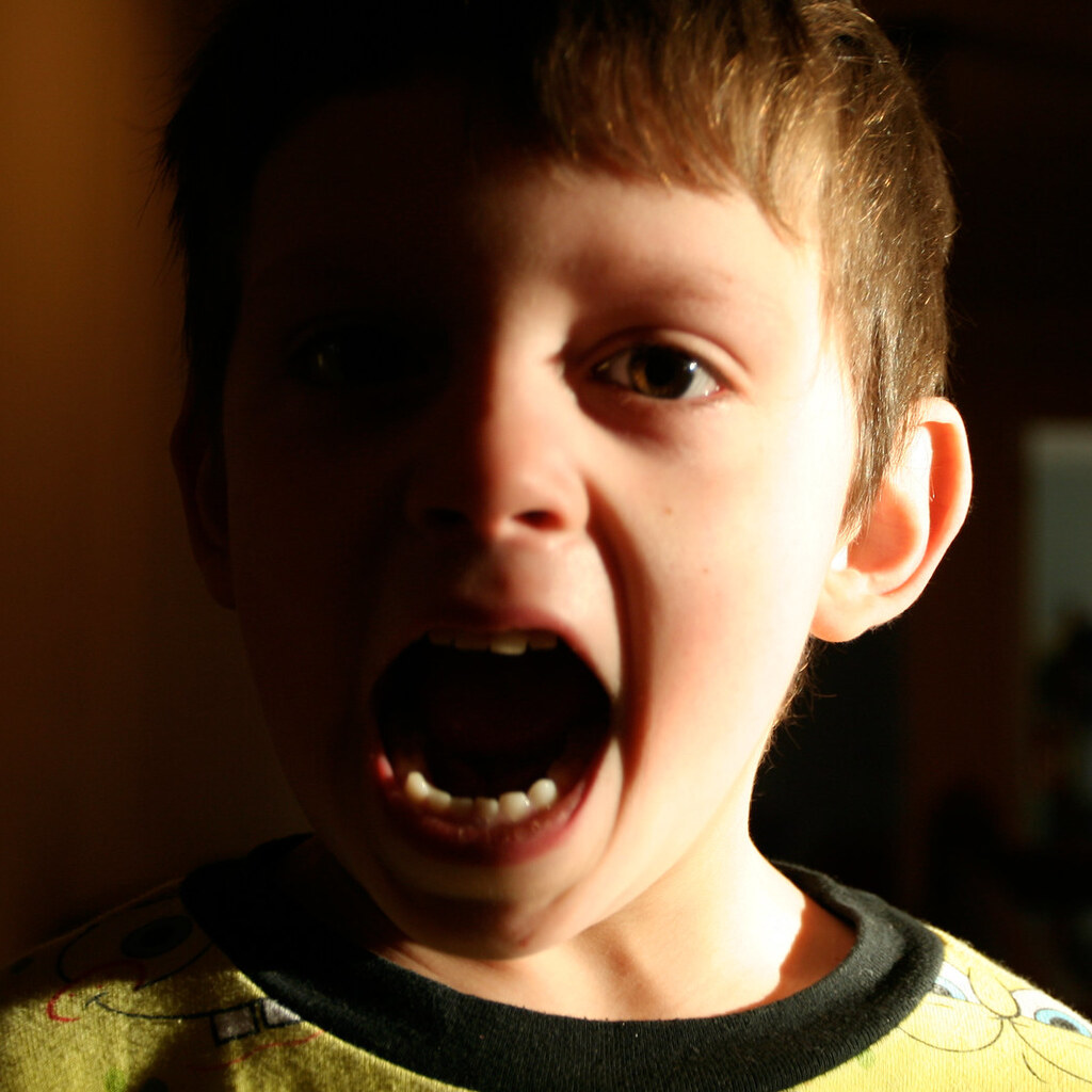Photo of a boy screaming