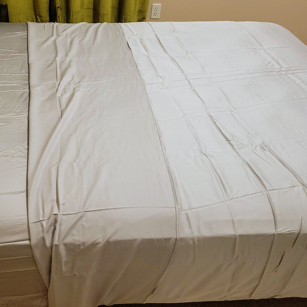 Photo of sheets on a bed.
