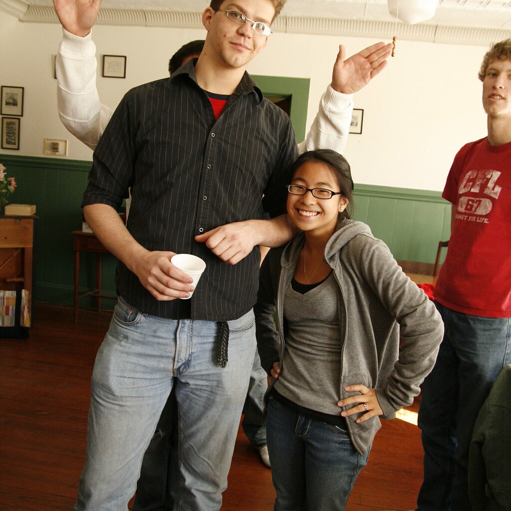 Photo of a short woman next to a tall man