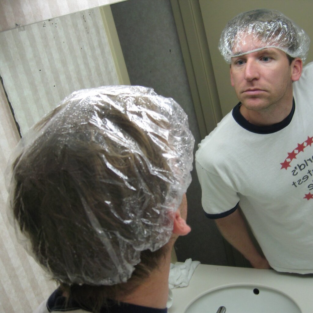 Photo of someone wearing a shower cap