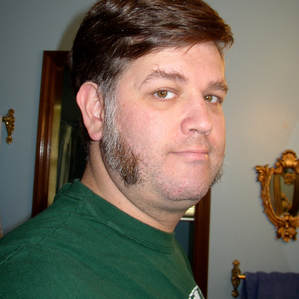 Photo of a man with sideburns