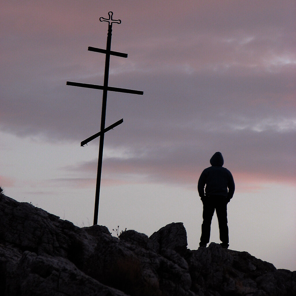 Photo of a young man in silhouette.
