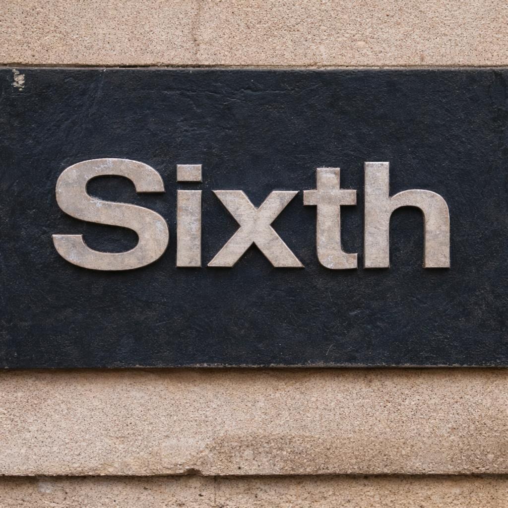 Photo of a sign that says sixth