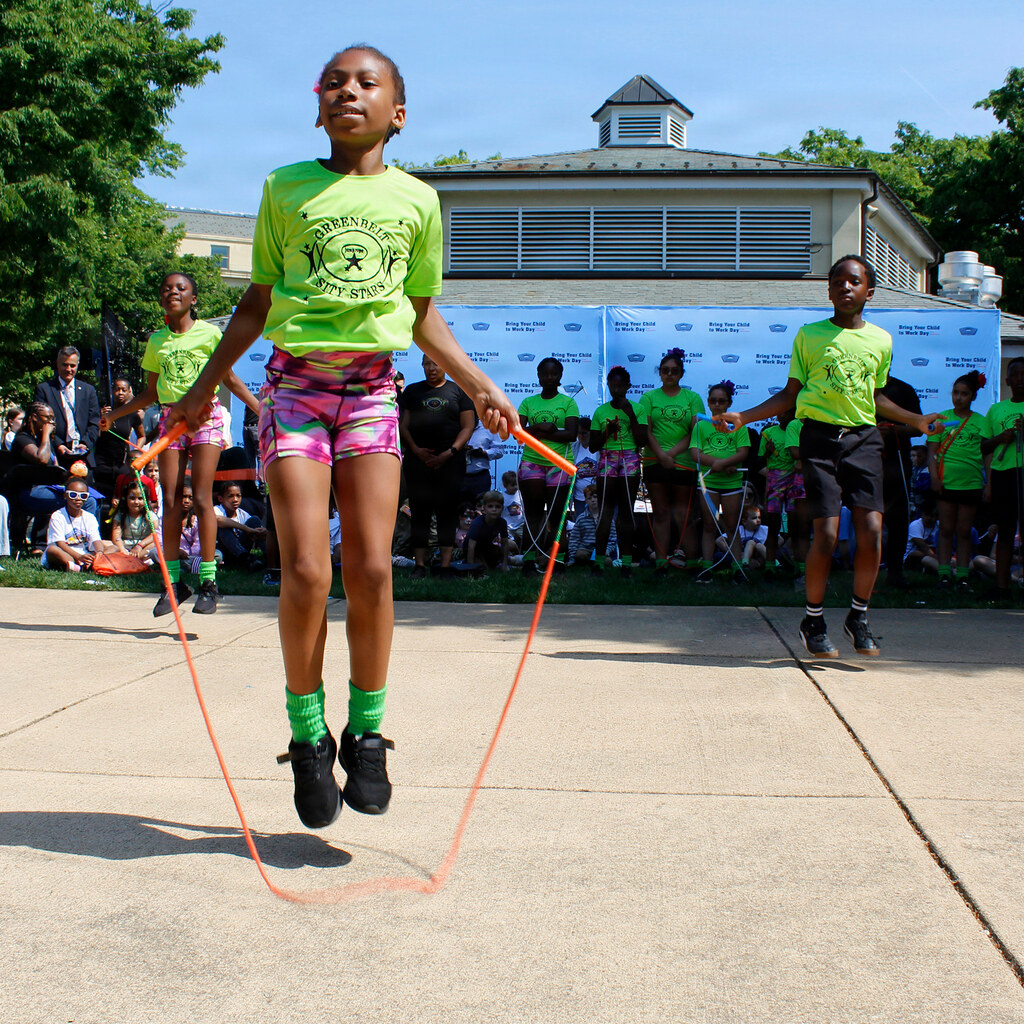 Photo of some children playing jump rope