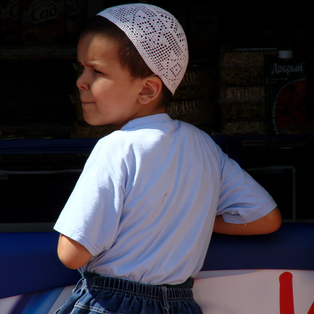 Photo of a boy wearing a skullcap