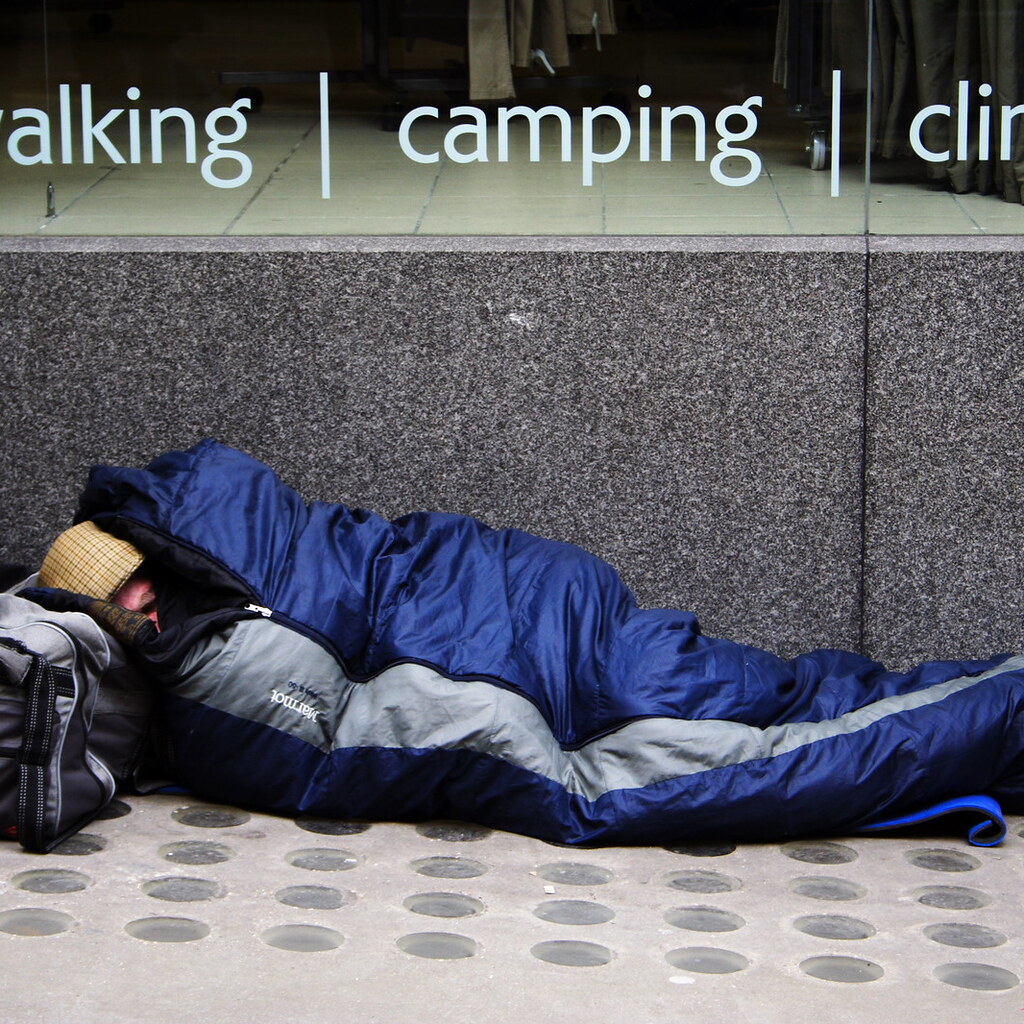 Photo of a man in a sleeping bag