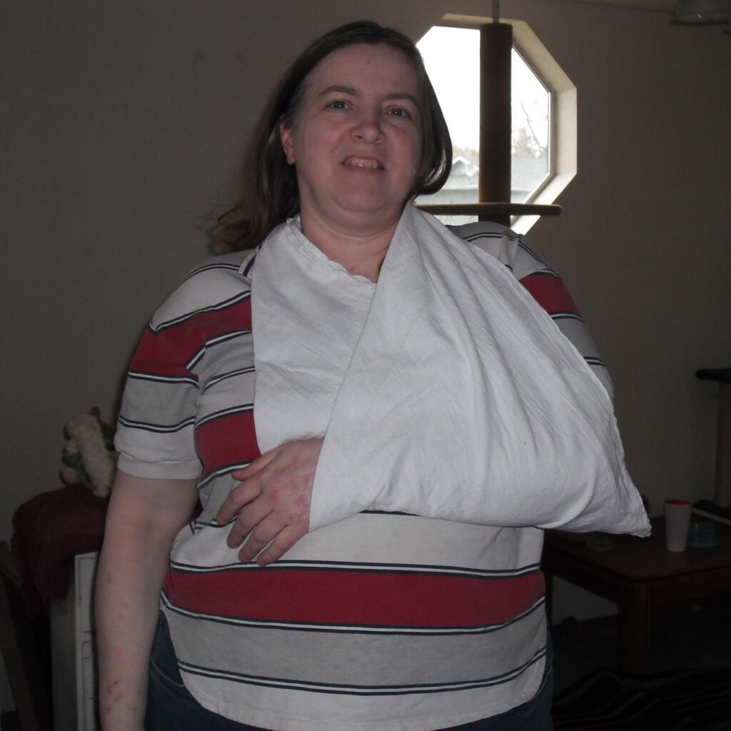 Photo of someone with their arm in a sling