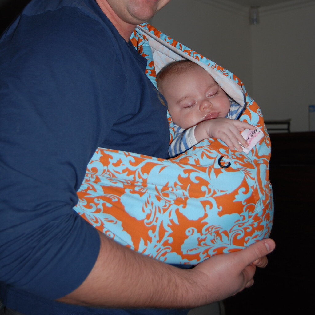 Photo of a baby in a sling