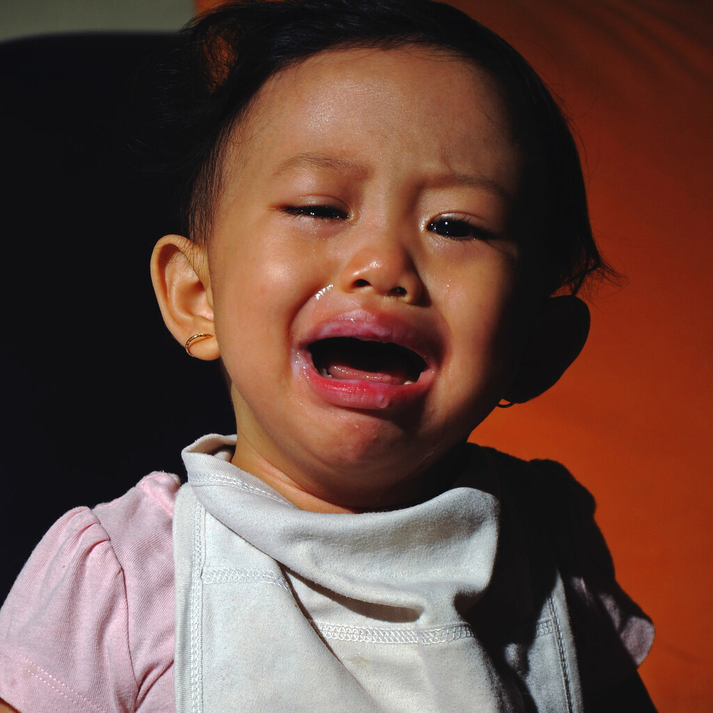 Photo of a child sobbing