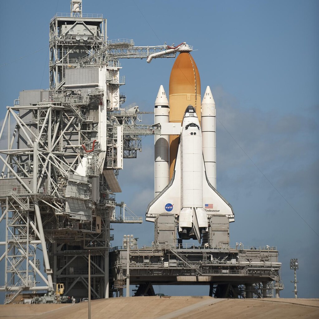 Photo of a space shuttle on the launchpad