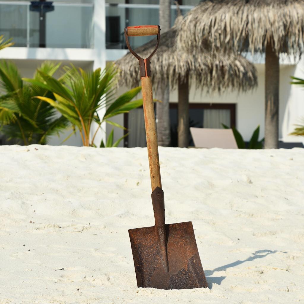 Photo of a man using a spade