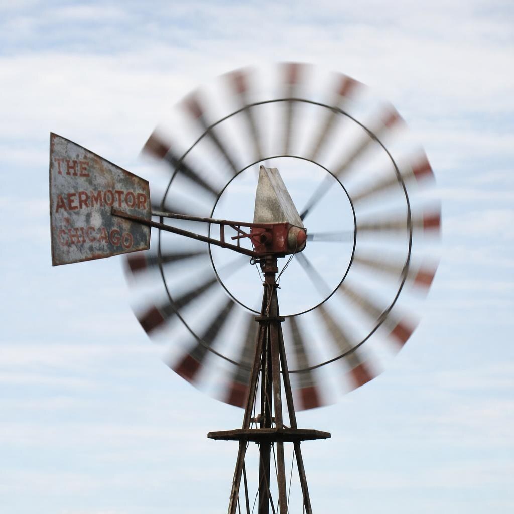 Photo of a windmill spinning