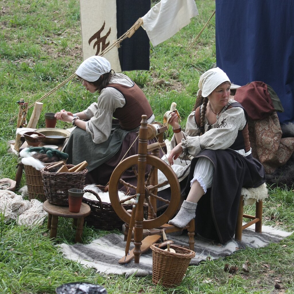Photo of women using spinning wheels