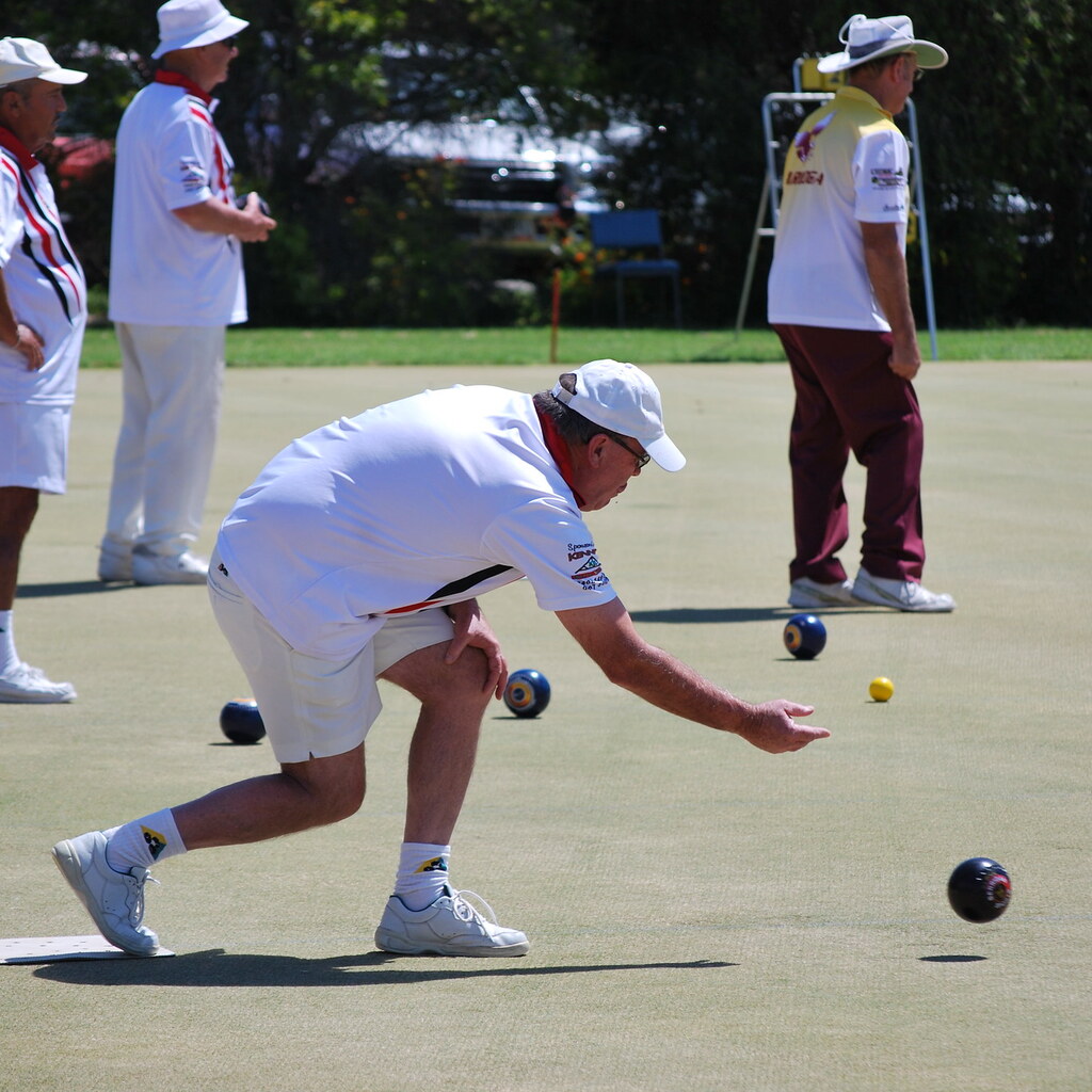 Photo of people playing lawn bowls