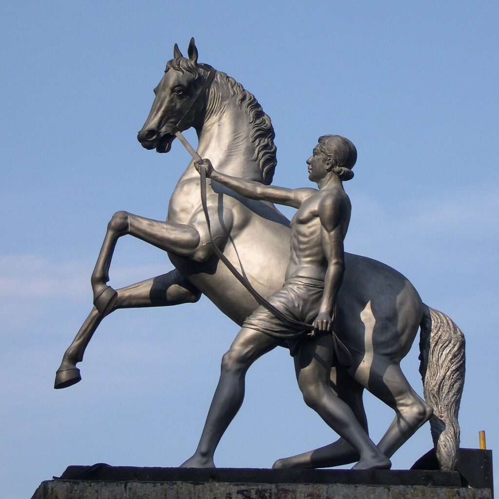 Photo of a statue of a man and a horse