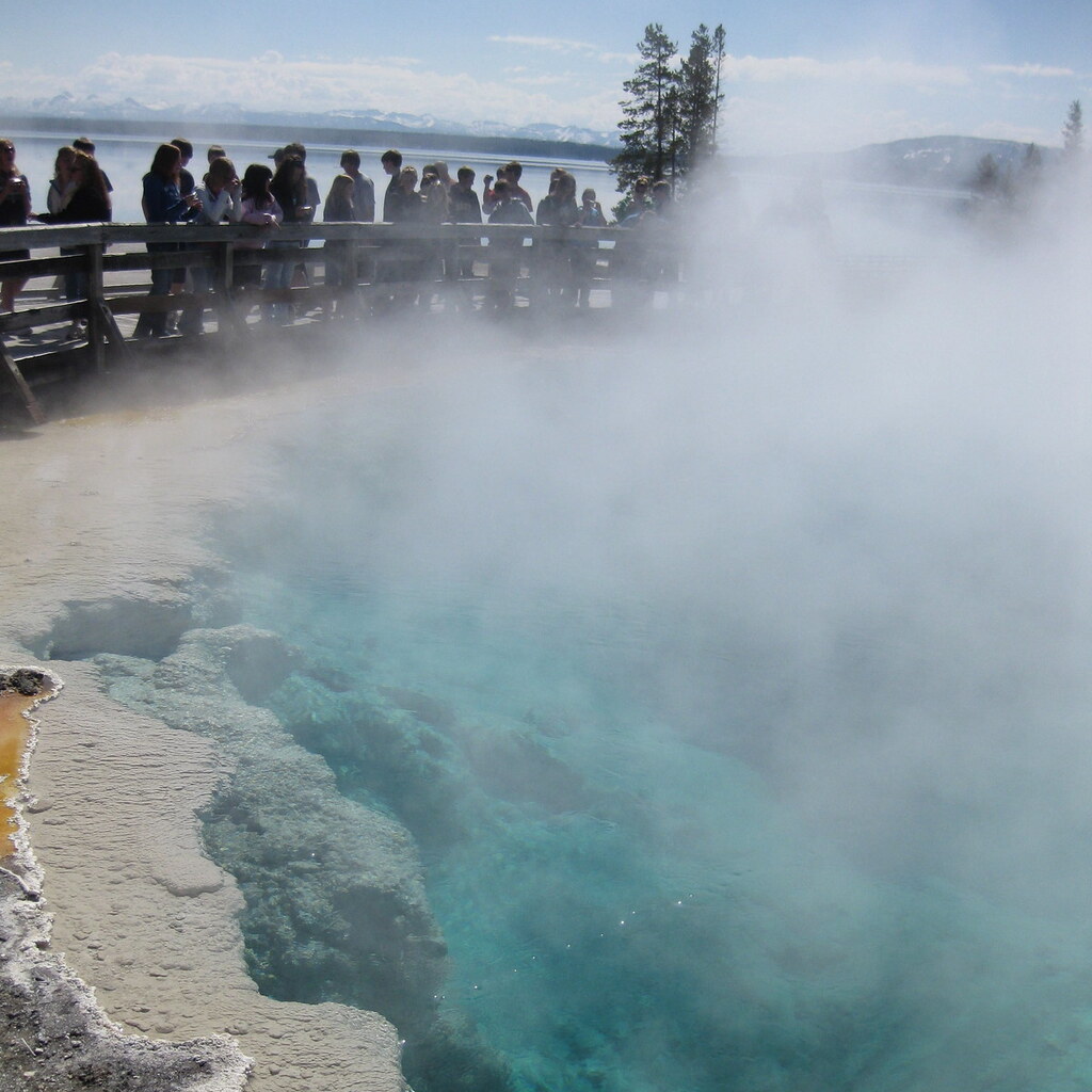 Photo of steam rising from a hot pool.