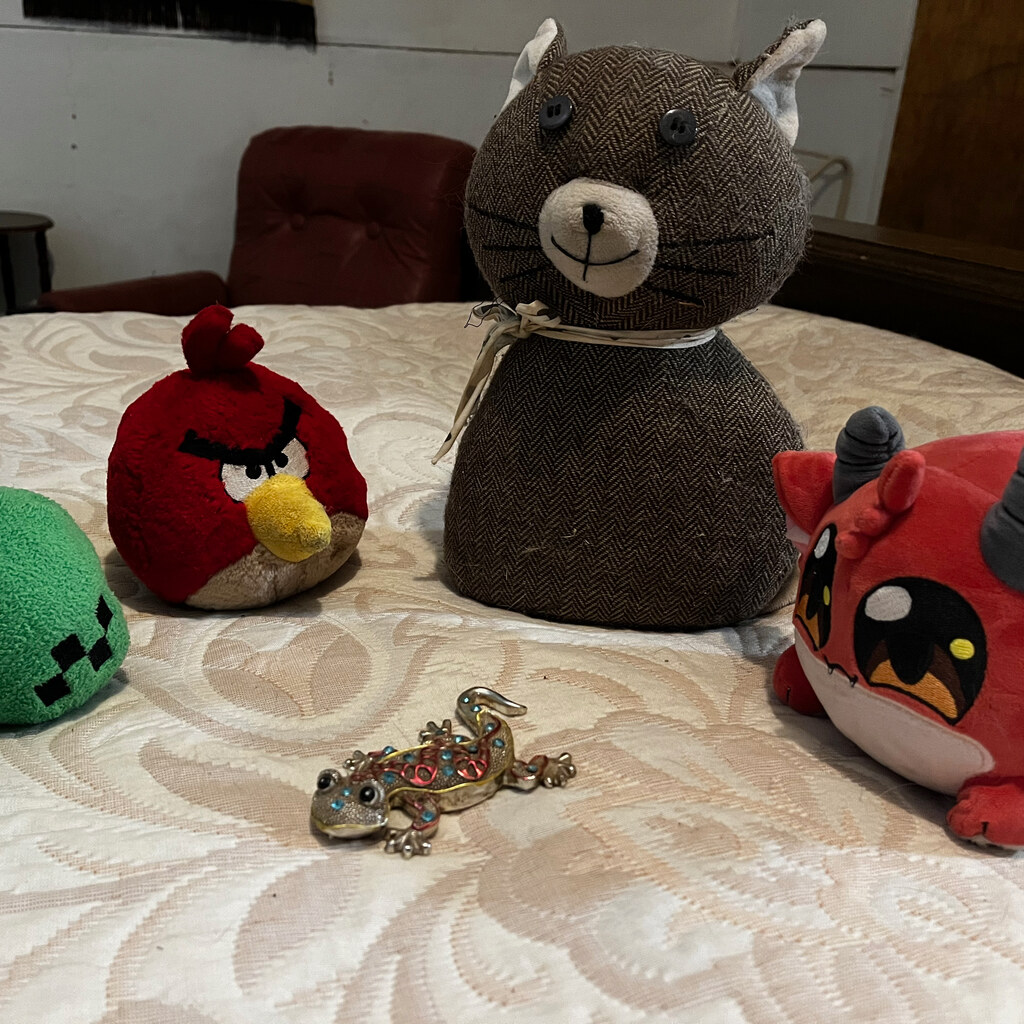 Photo of an ornament surrounded by toys