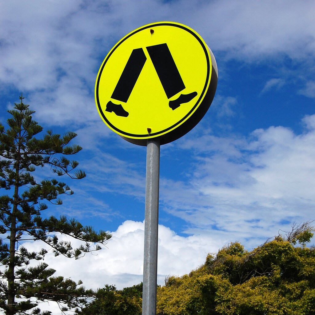 Photo of a pedestrian crossing sign