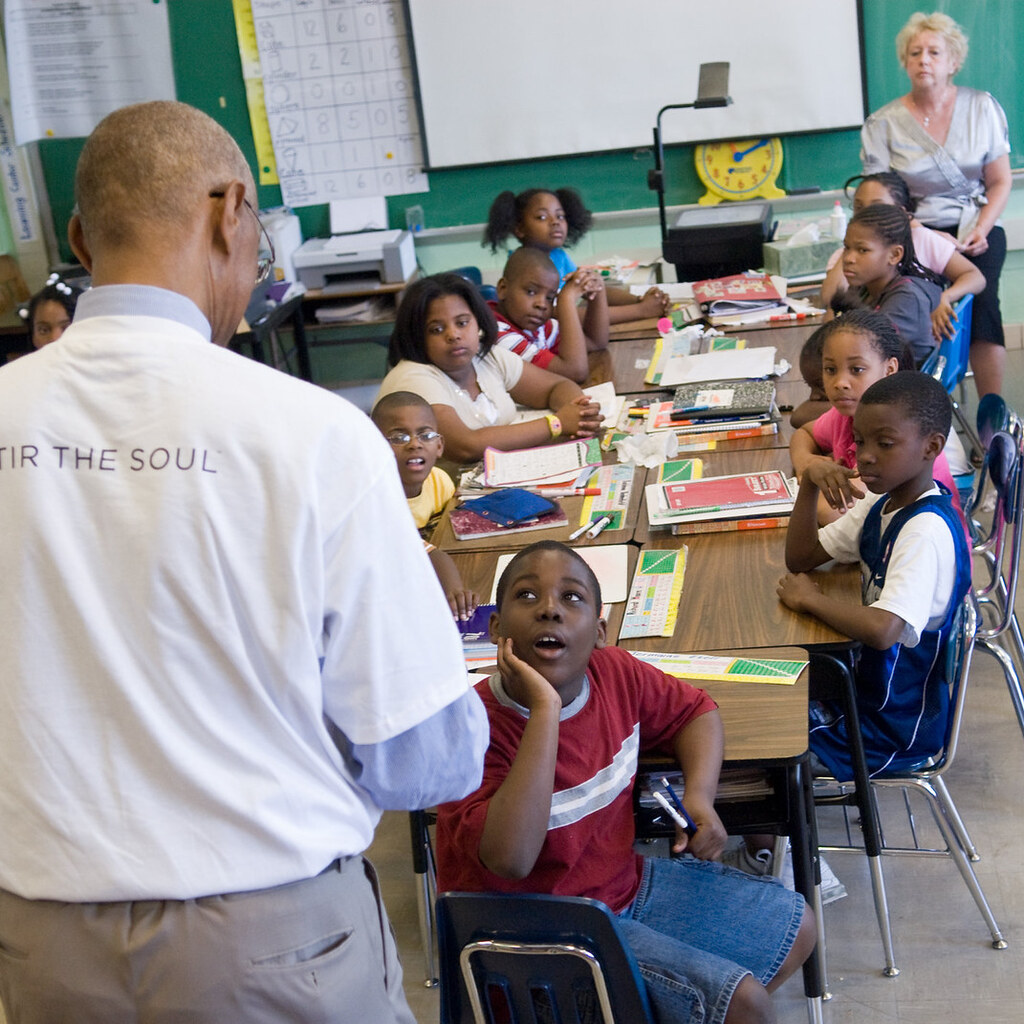 Photo of a man teaching a class.