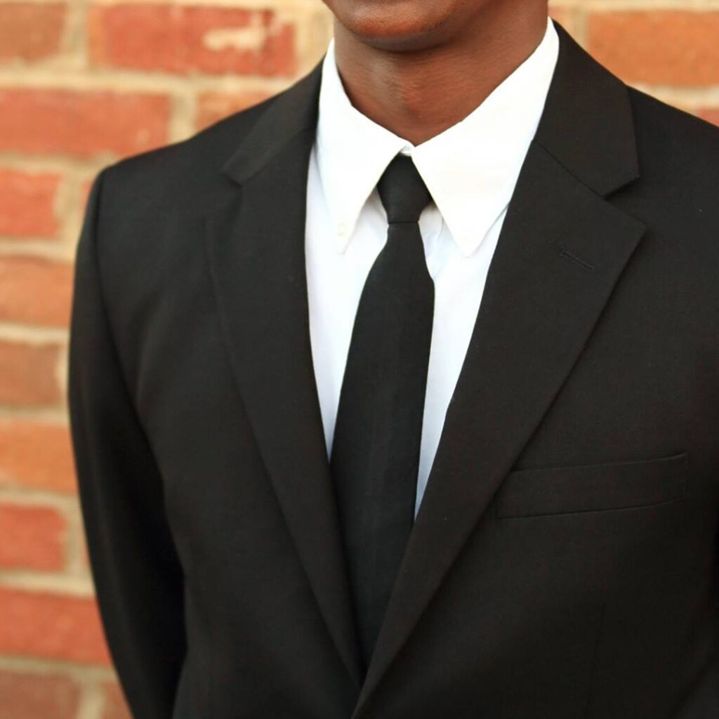 Photo of a man wearing a tie.