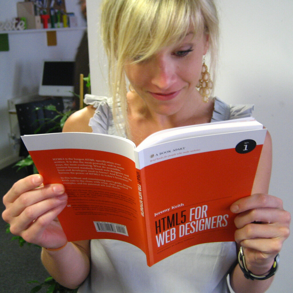 Photo of a woman reading a book