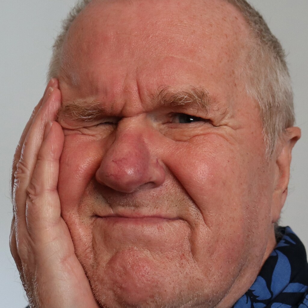 Photo of a man with a toothache