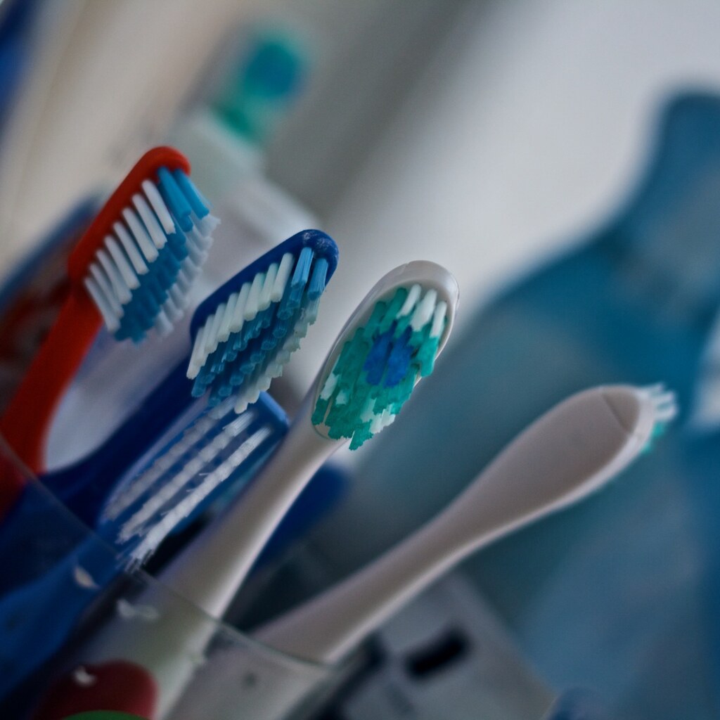 Photo of a child using a toothbrush