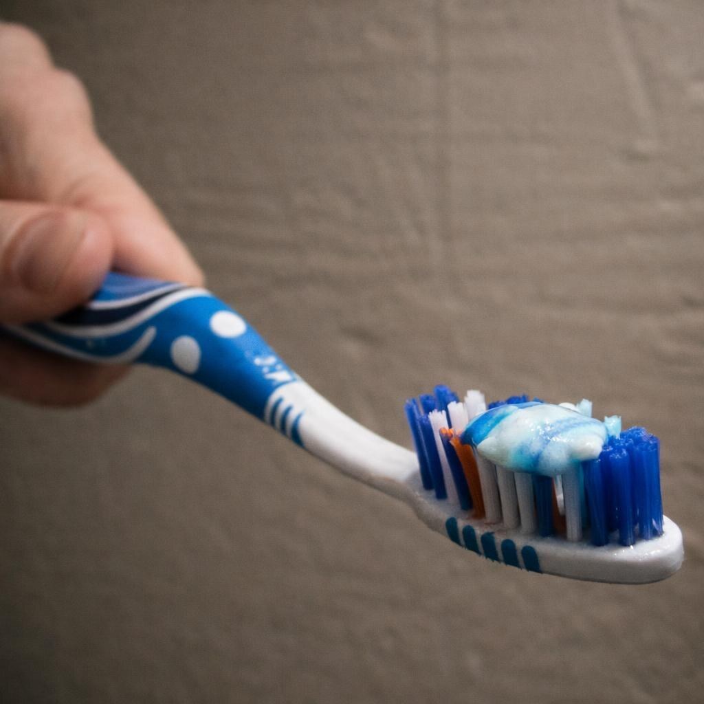 Photo of toothpaste on a toothbrush