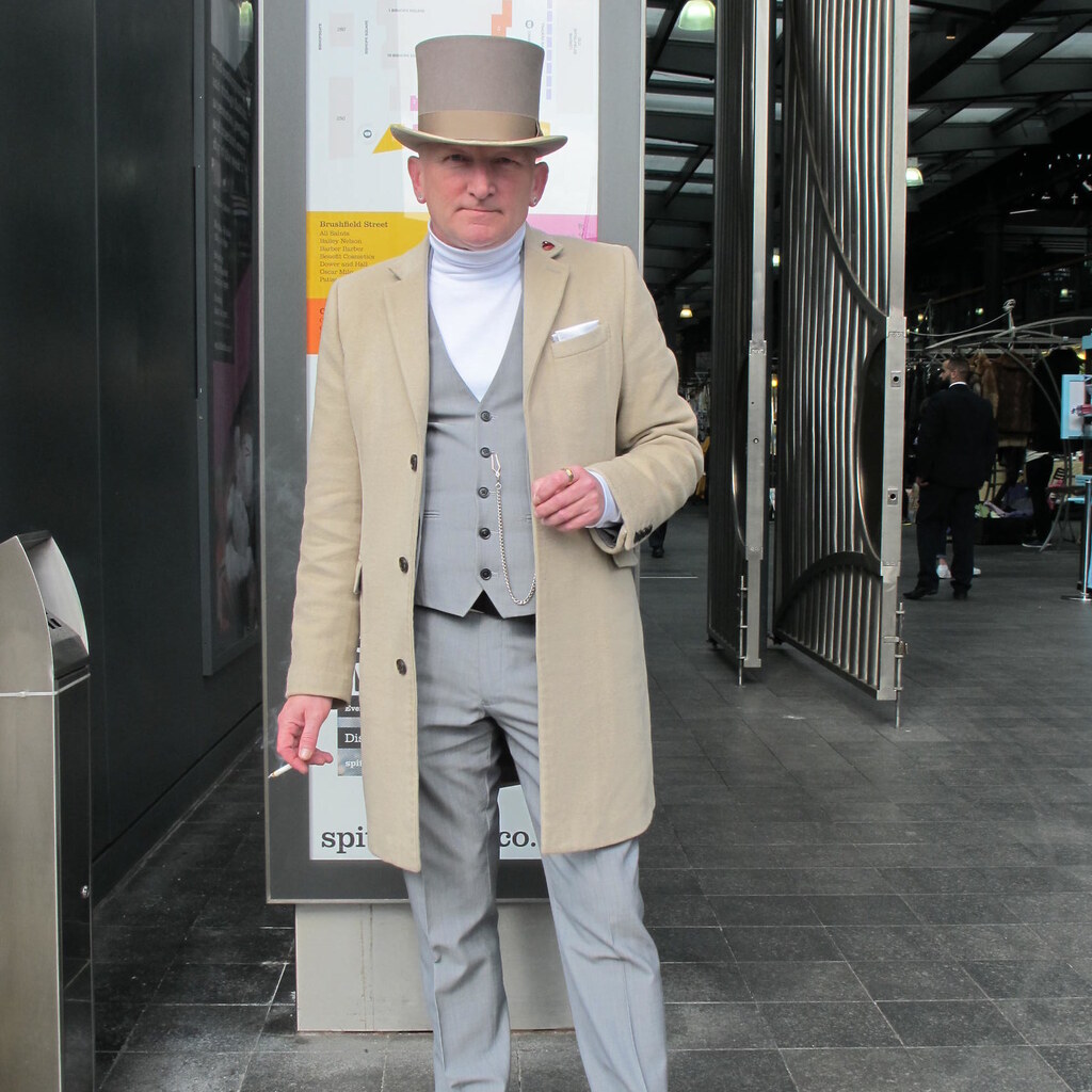 Photo of a man wearing a top hat