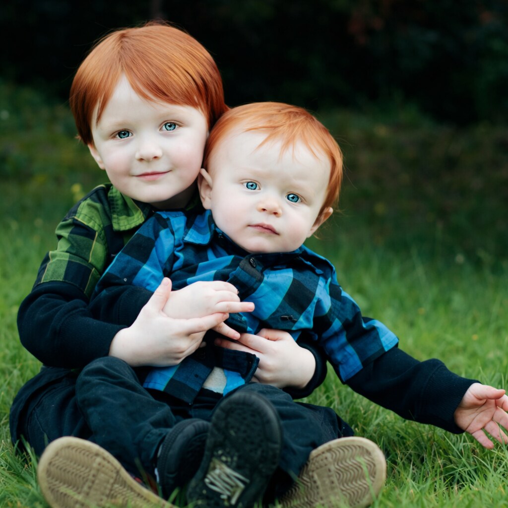 Photo of two red-haired children
