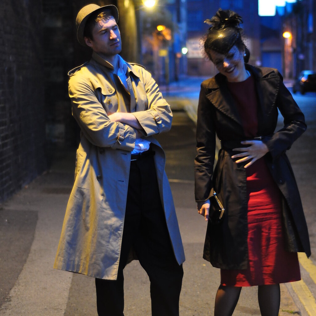 Photo of a man wearing a trenchcoat