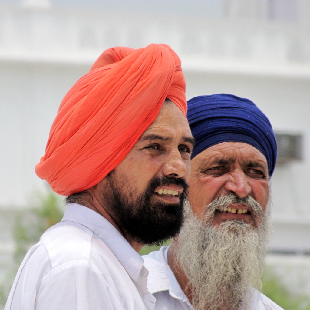 Photo of two men wearing turbans